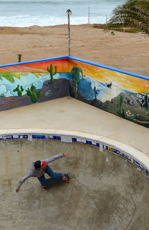 Skateboard and empty pool